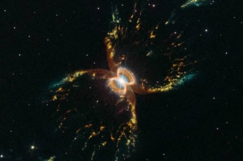 NASA为庆祝哈勃太空望远镜启用29周年 发放最新南蟹状星云Hen 2-104照片