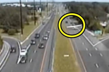 美国新泽西州小型飞机在高速公路紧急降落 险横扫路上车辆