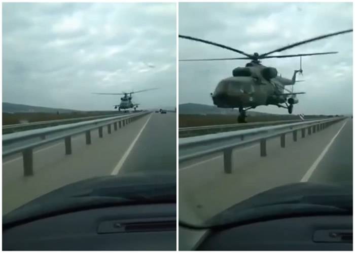 俄罗斯车臣古杰尔梅斯军用直升飞机异常低飞险与汽车相撞