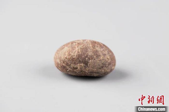 吉林大学考古团队发现距今6000多年石制蚕茧